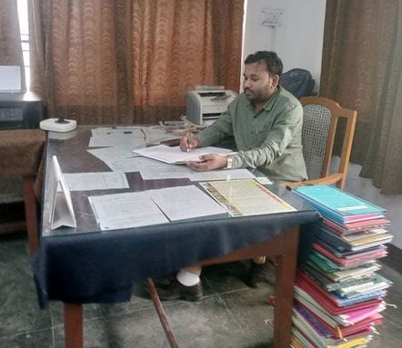 Government departments opened on Sunday, officials were seen completing accounting