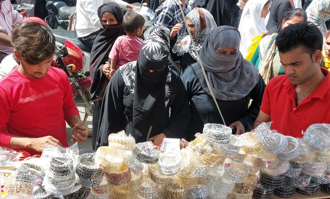 The market is bustling with activity, shopping done before Eid