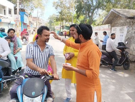 On Hindu New Year, BJP Yuva Morcha applied saffron tilak and distributed Hanuman Chalisa.