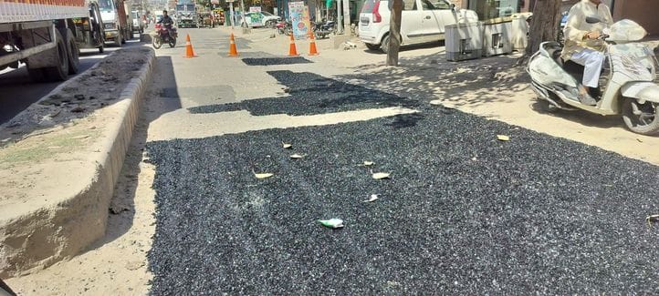 Patchwork done on the main road that was broken for two years
