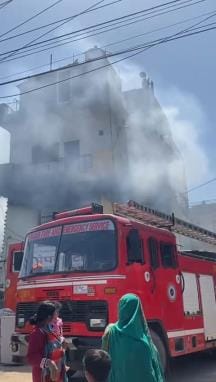 Panic due to fire in retired inspector house goods burnt to ashes