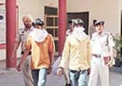 Two accused caught with three pistols on 1 day remand