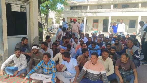 Employees sit on strike for salary
