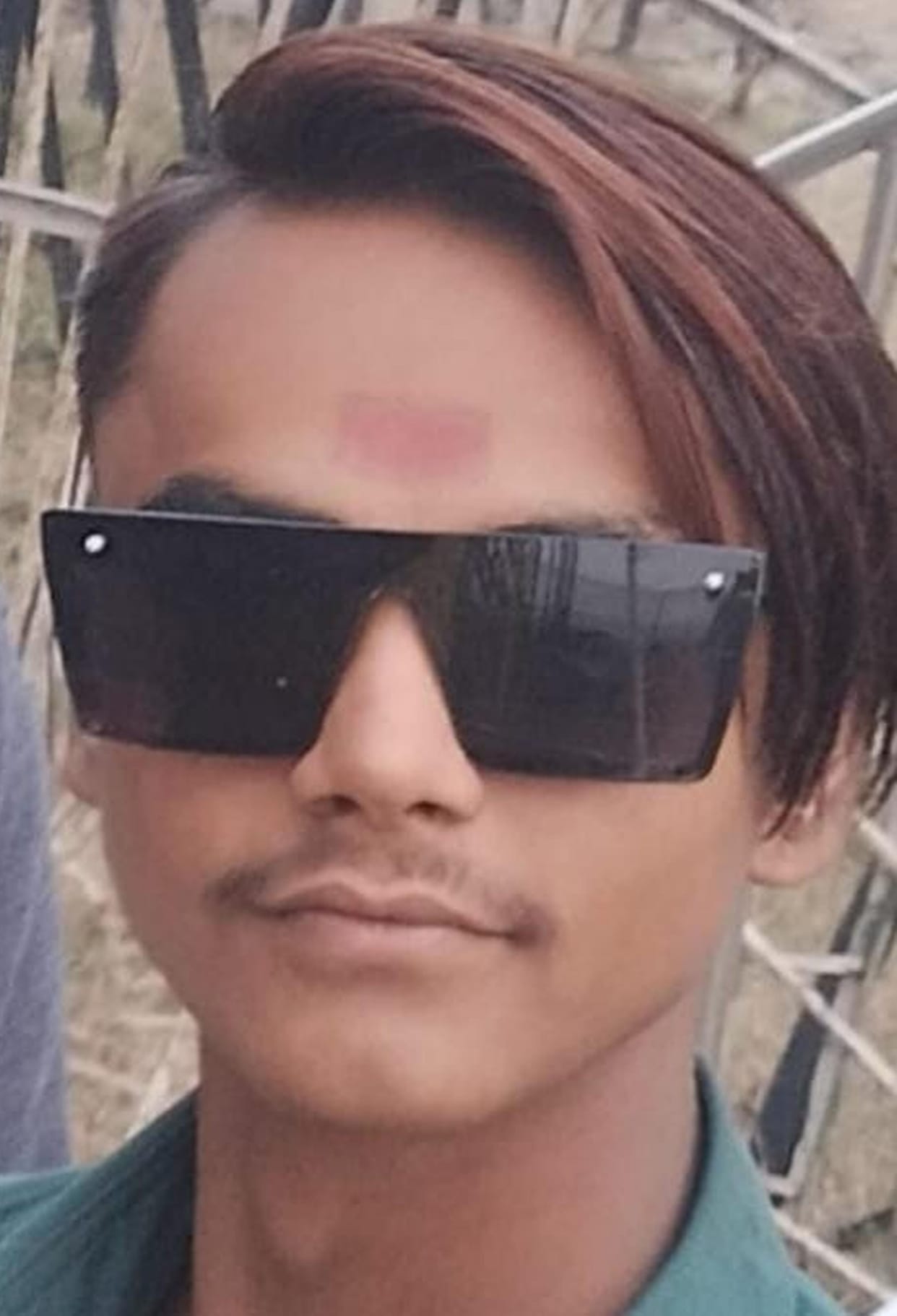 The body of a young man was found hanging from a noose