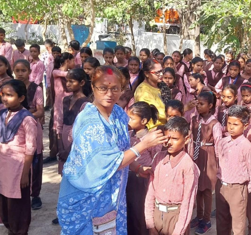 Children were welcomed by applying tilak