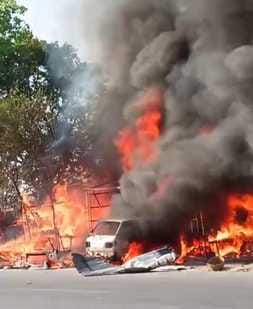 Cylinder exploded while refilling gas in a van, five shops burnt