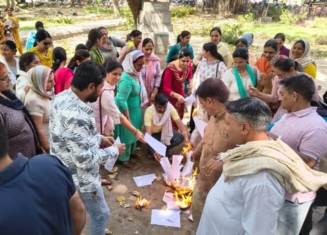 Employees burnt copies of government orders