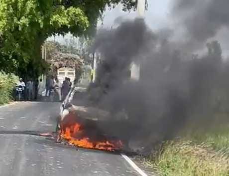 Fire breaks out in a car on the road
