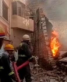 Fire broke out in a warehouse where bike parts were painted, causing panic
