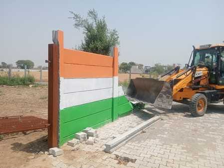 Bulldozer run on illegal farm house