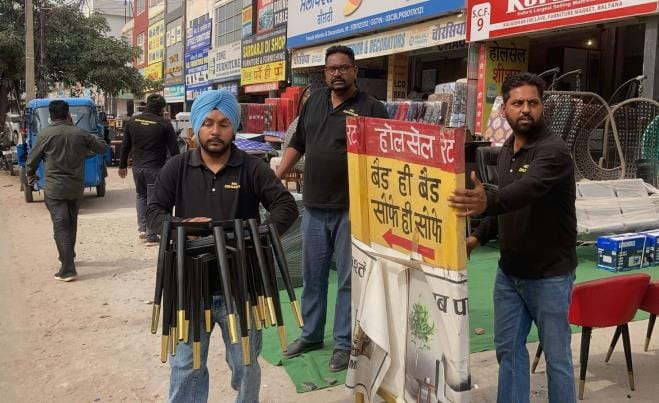 Items outside the yellow strip were confiscated in the furniture market