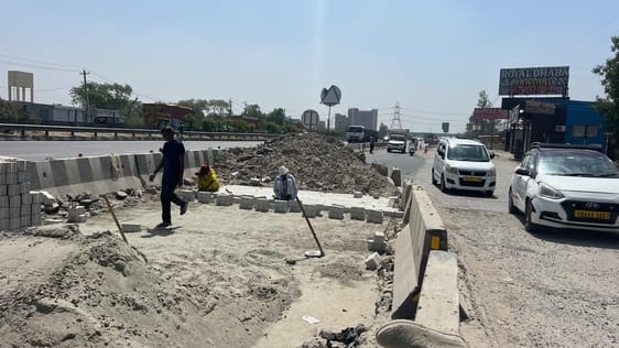 Debris dumped in the middle of the road, no indicators placed