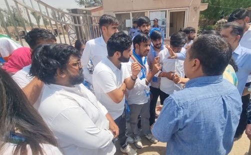 The students closed the main gate and shouted slogans