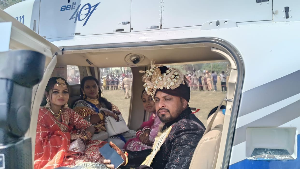 The groom arrived in Dhandardu village by helicopter to pick up the bride