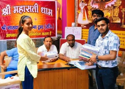 Books distributed to students at Mahasati Dham
