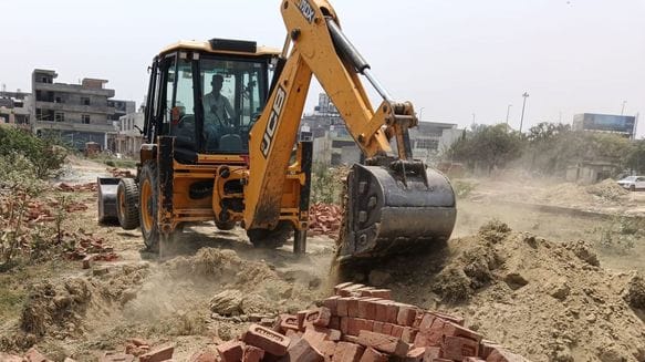 Bulldozers were run on the colony being built on 7.5 acres
