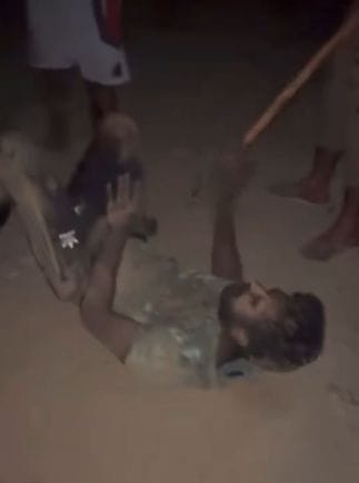In a 32 second video, the teacher was beaten with sticks 25 times