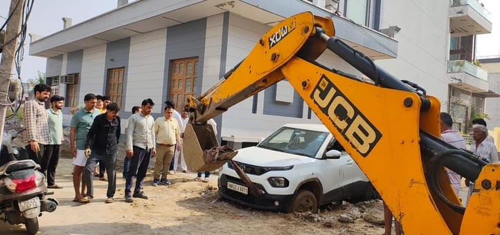 Street uprooted and left in Basant Vihar, vehicles stuck