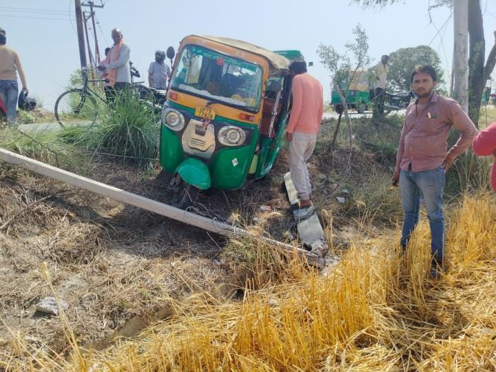 Overloaded auto collided with electric pole, two injured