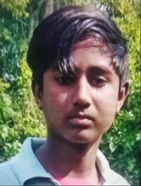 A teenager died after being trapped under a roof that collapsed during a storm
