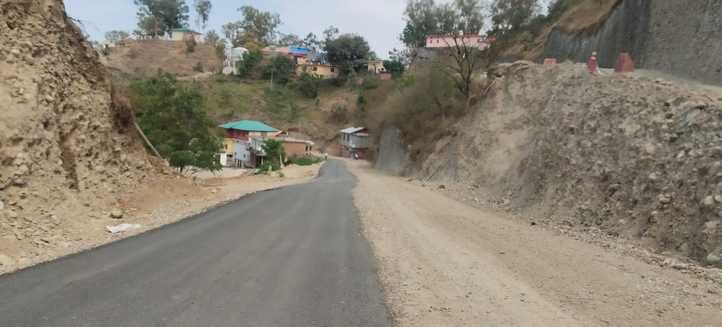 Work of paving the road started in Tauni Devi market.