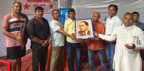 Meritorious students were honored by giving them copies and pens