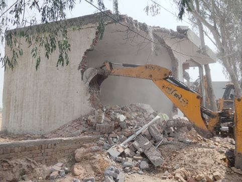 Illegal colony developed on four acres demolished