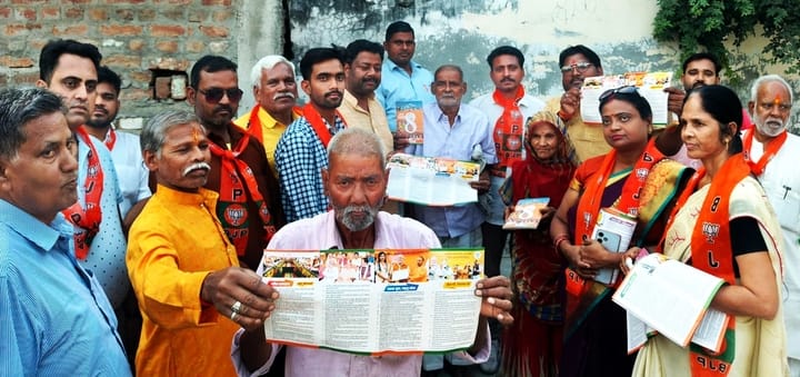 Information about government schemes given by distributing leaflets