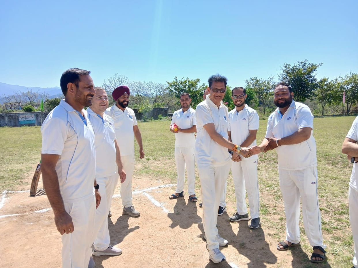 The students' team defeated the staff's team and won the title