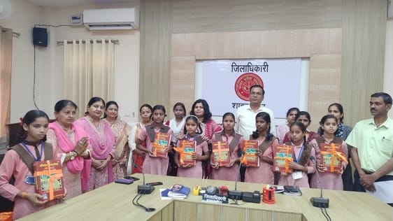 Online classes started, a copy of Gita given to a student of every school