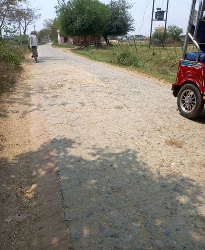 Potholes in the road, causing problems in movement
