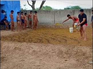 Famous wrestlers are getting ready by learning wrestling tricks in Bhupendra Akhara