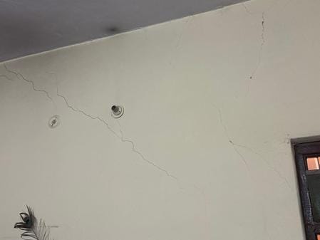 Cracks appeared in houses due to pipeline leakage