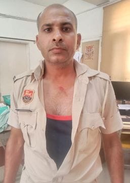 Policeman beaten up during search, uniform torn