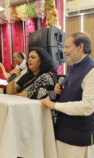 The cooperative minister sang a song with his wife