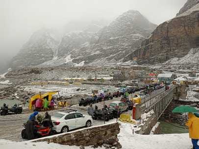 Tourists have a lot of fun amidst the snow