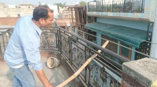 Due to bending of the pole, 11 KVA line touched the iron grill, electrical equipment got burnt