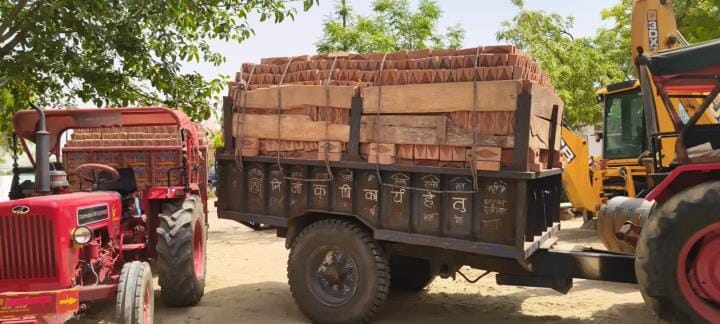 Five overloaded tractor trolleys seized