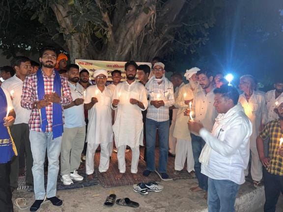 The family did not take the dead body as the accused were not arrested and took out a candle march