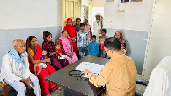 Long queue of patients suffering from cough and fever and stomach ailments