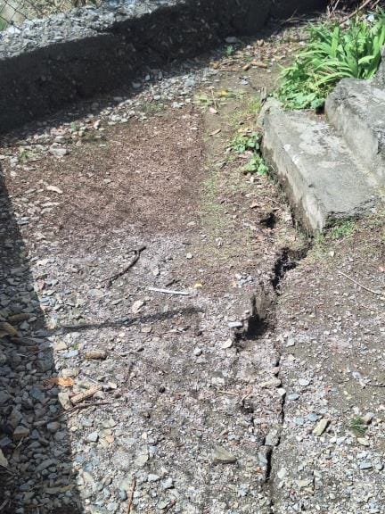 Cracks appeared in the Dandiot Sandrun school ground due to rain, damage to a kutcha house in Bhandar