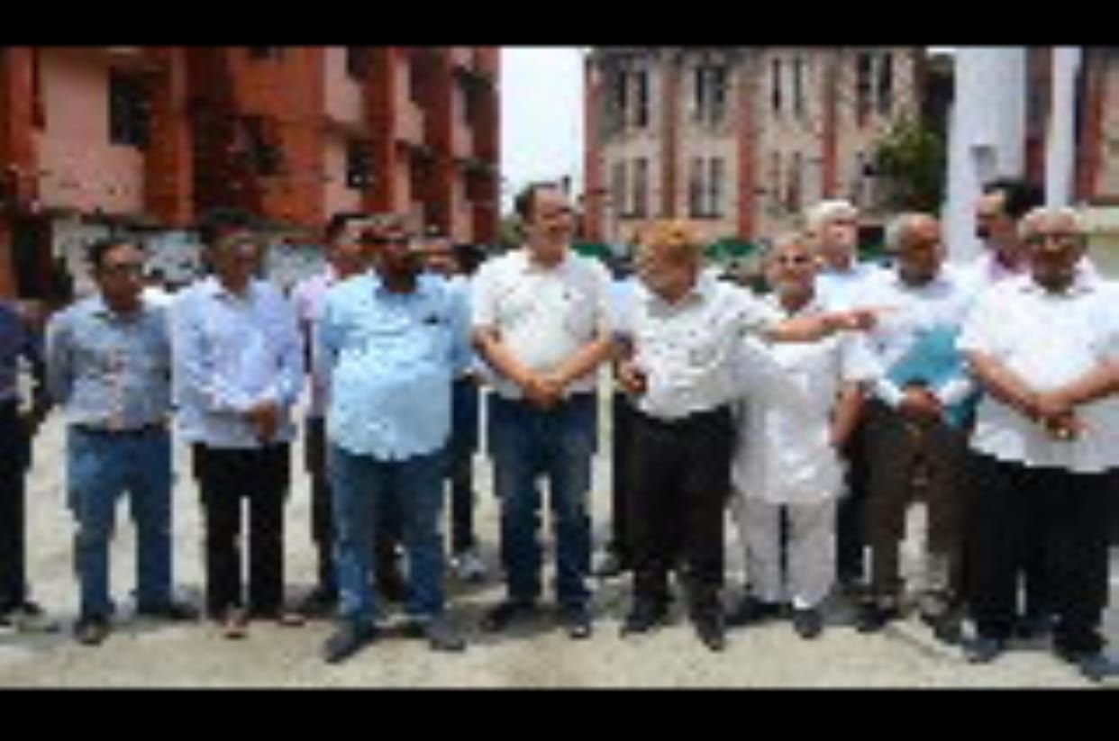 Liquor shop opposed in front of ADC