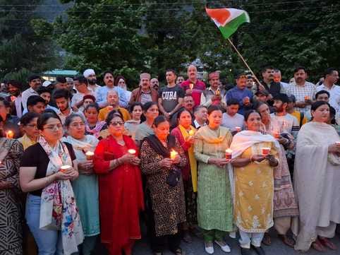Candle march taken out in protest against terrorist attack