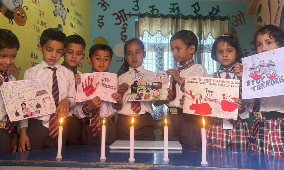 Students paid tribute by lighting candles
