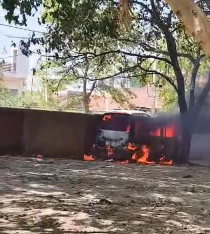 A van parked in the junkyard of the tehsil premises was burnt