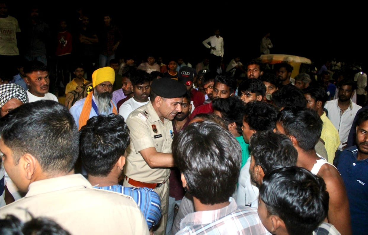 Truck driver ran over two bullet riders; one's head came under the truck, death, another injured