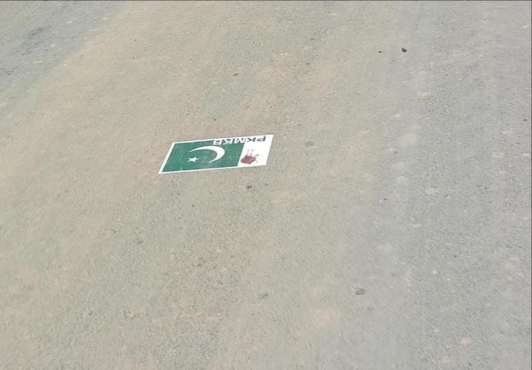 Pamphlets looking like Pakistan flags are pasted on the streets