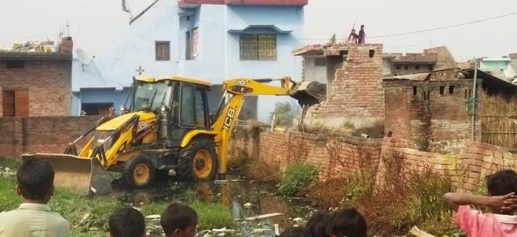 Revenue department's bulldozer runs on encroachment