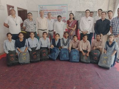 Bags and water bottles distributed in Koreawas Vidyalaya