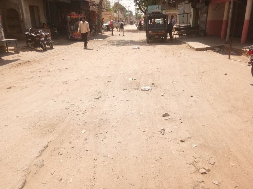 Every day people have to cross the potholes spread over a distance of 100 meters to reach the railway station